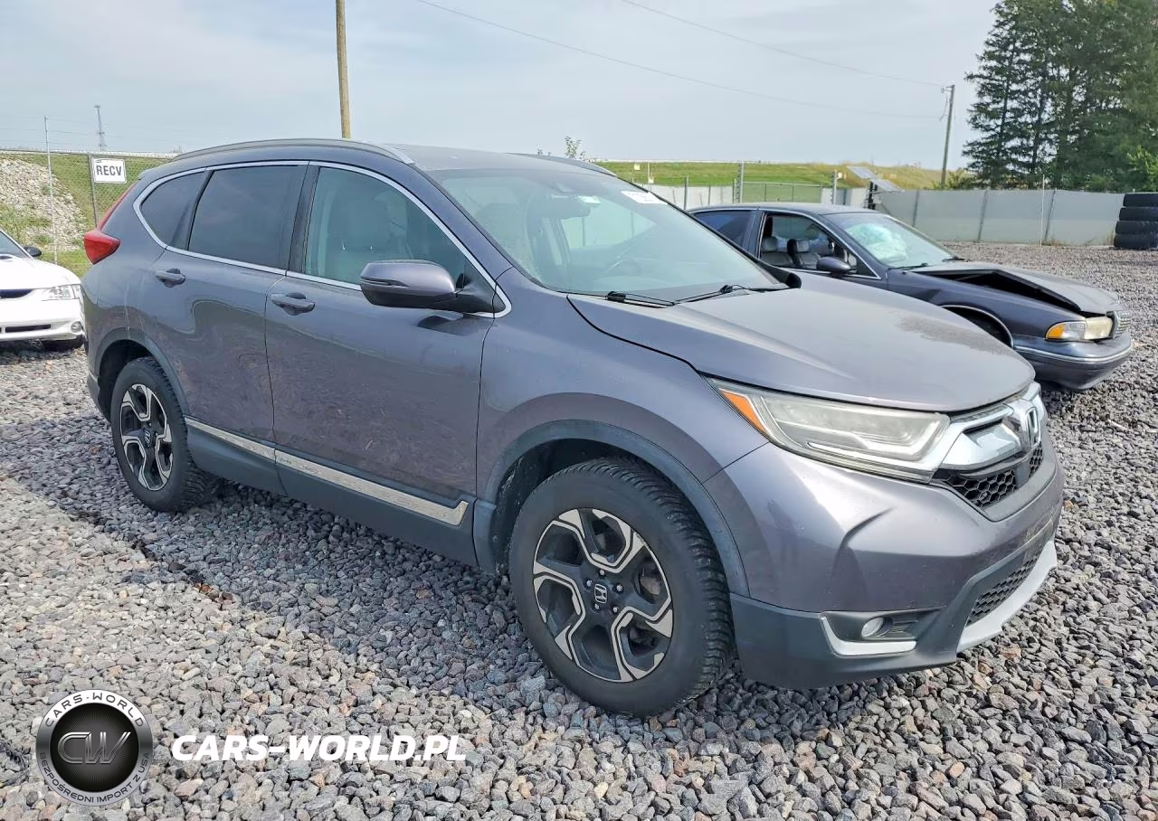 2017 Honda Cr-V Touring VIN:5J6RW2H93HL000681 - 4