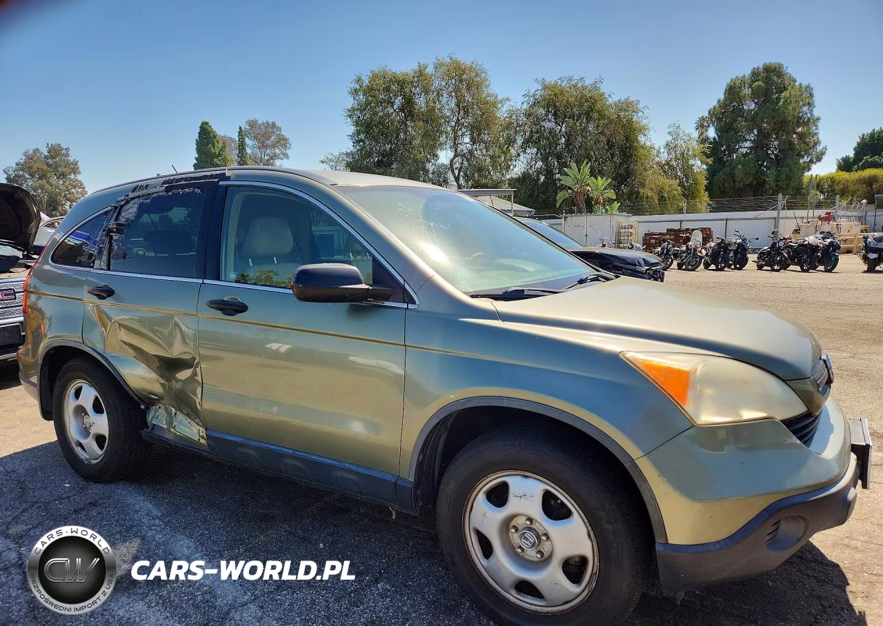 2009 Honda Cr-V Lx VIN:JHLRE38329C009886 - 4