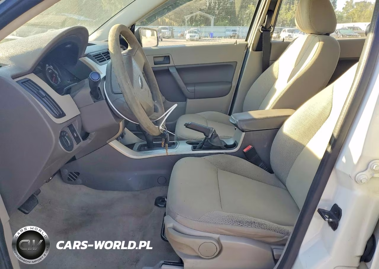 2009 Ford Focus S VIN:1FAHP34N09W133475 - 7