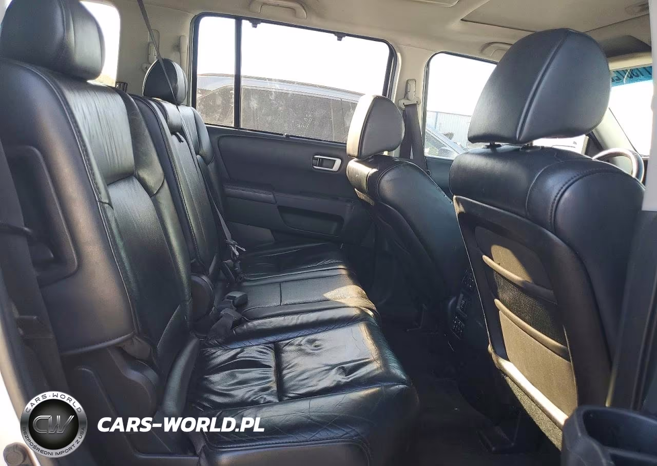 2011 Honda Pilot Touring VIN:5FNYF3H96BB040304 - 11