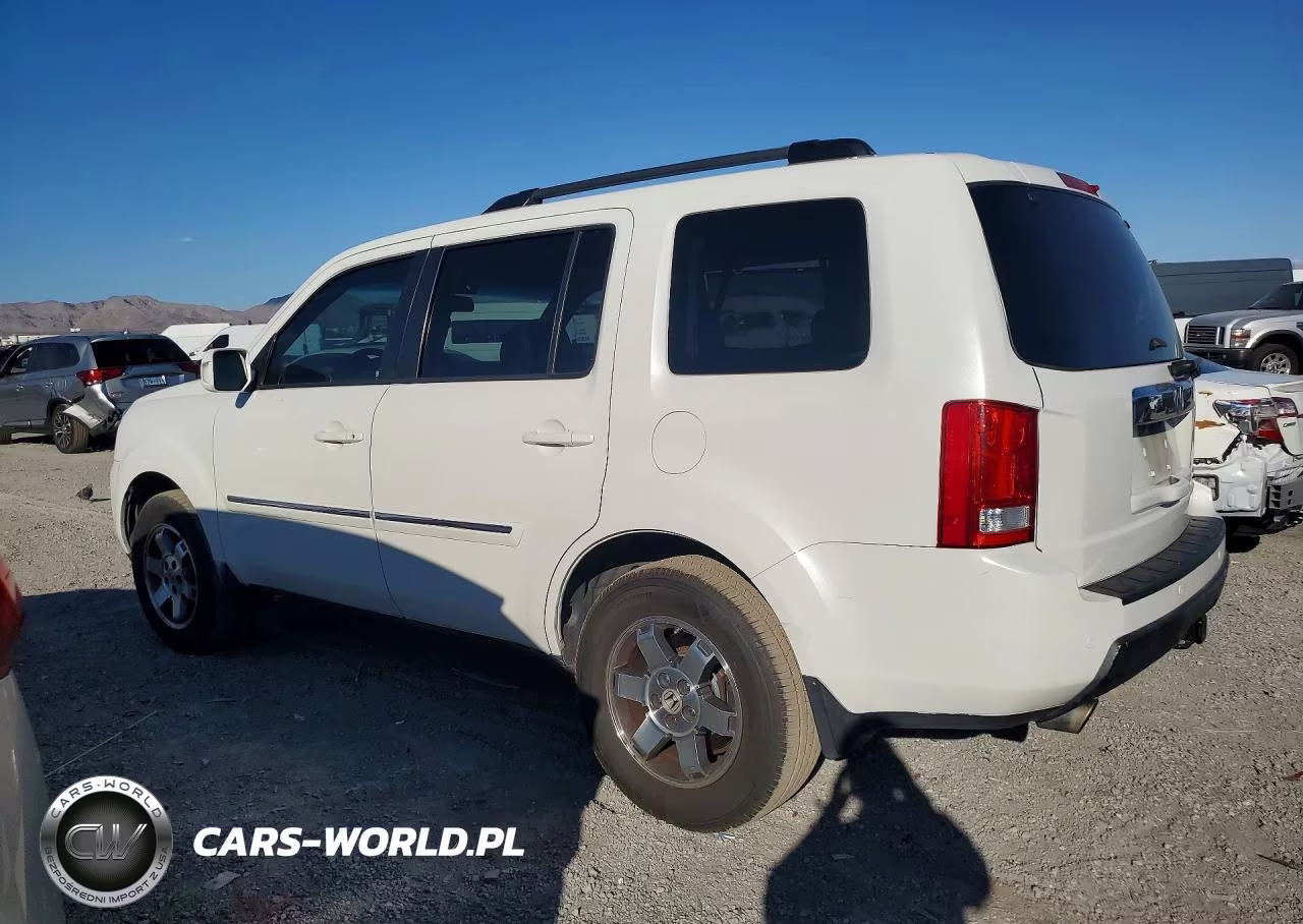 2011 Honda Pilot Touring VIN:5FNYF3H96BB040304 - 2