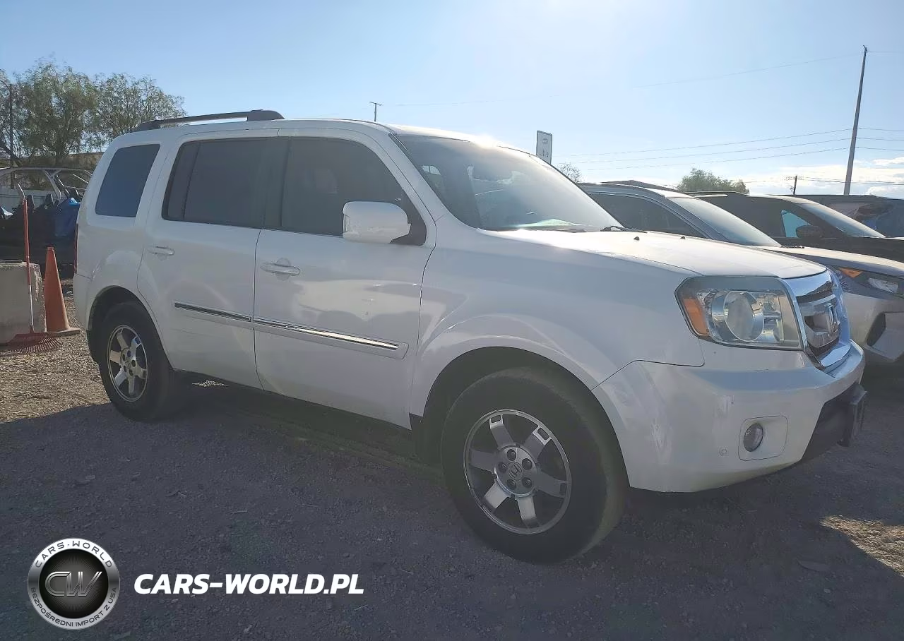 2011 Honda Pilot Touring VIN:5FNYF3H96BB040304 - 4