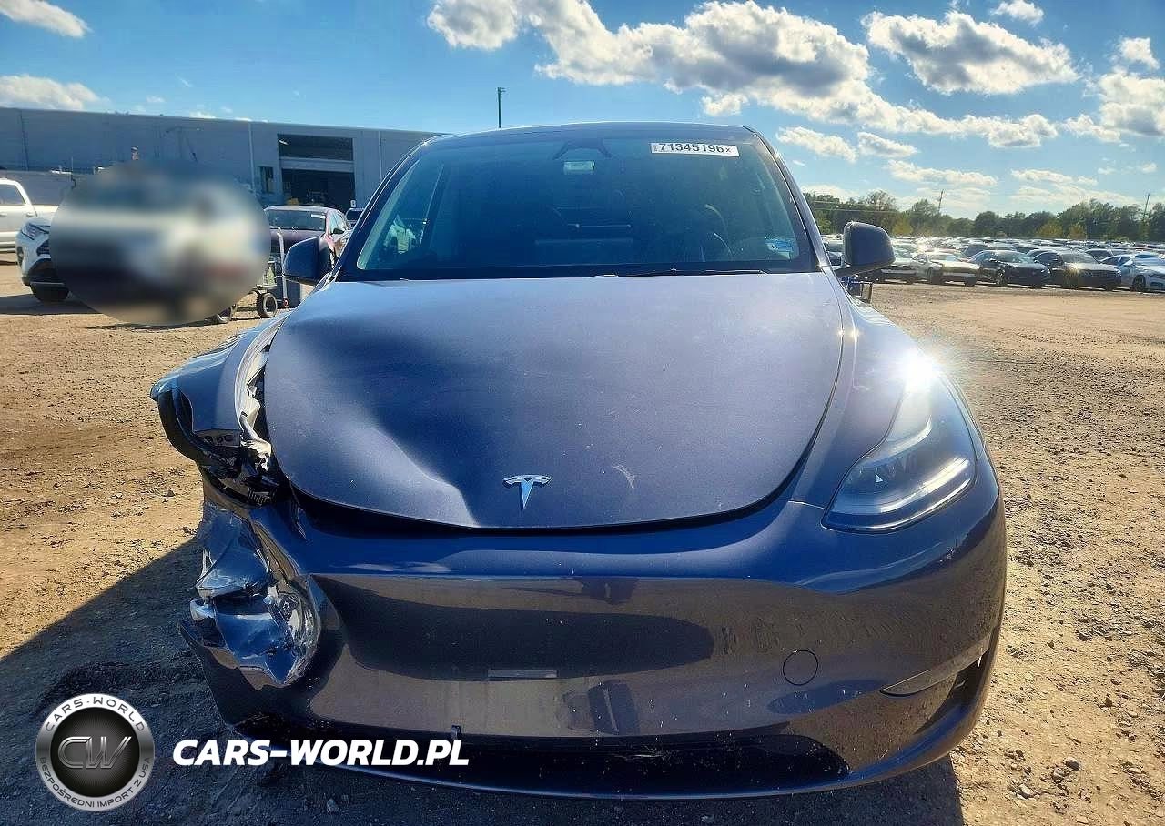 2023 Tesla Model Y VIN:7SAYGDEE4PA200983 - 5