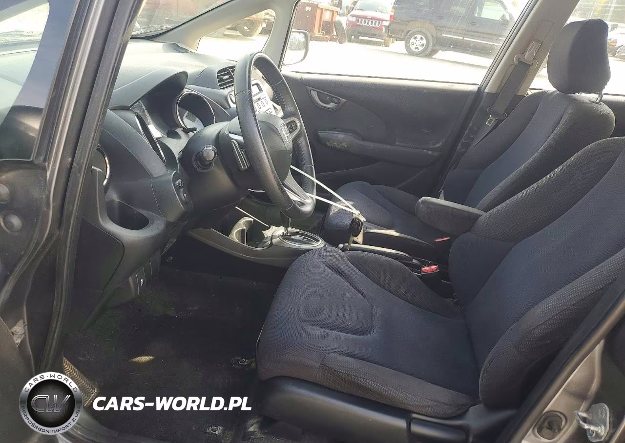 2013 Honda Fit Sport VIN:JHMGE8H55DC051012 - 7