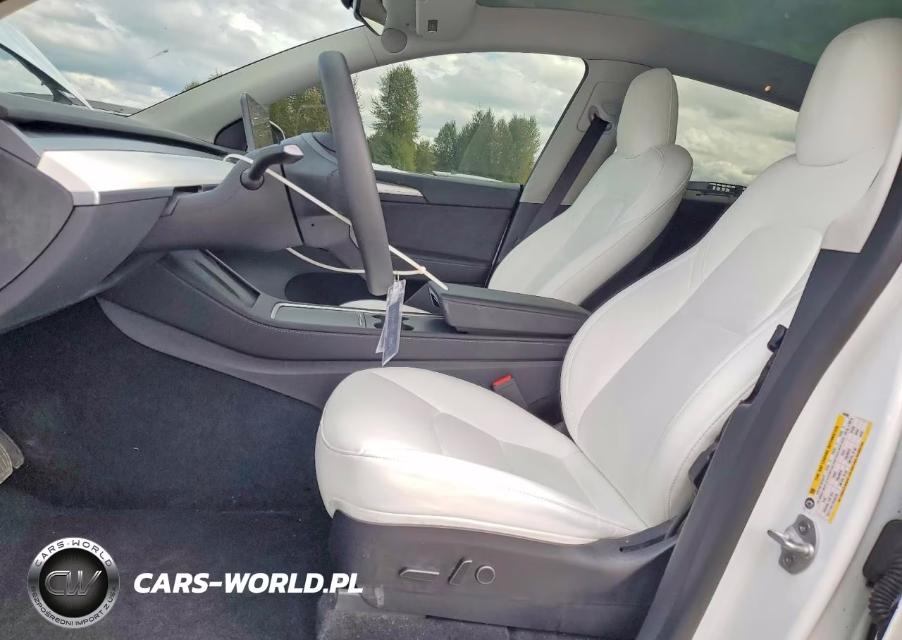 2023 Tesla Model Y VIN:7SAYGDEE2PF662882 - 7