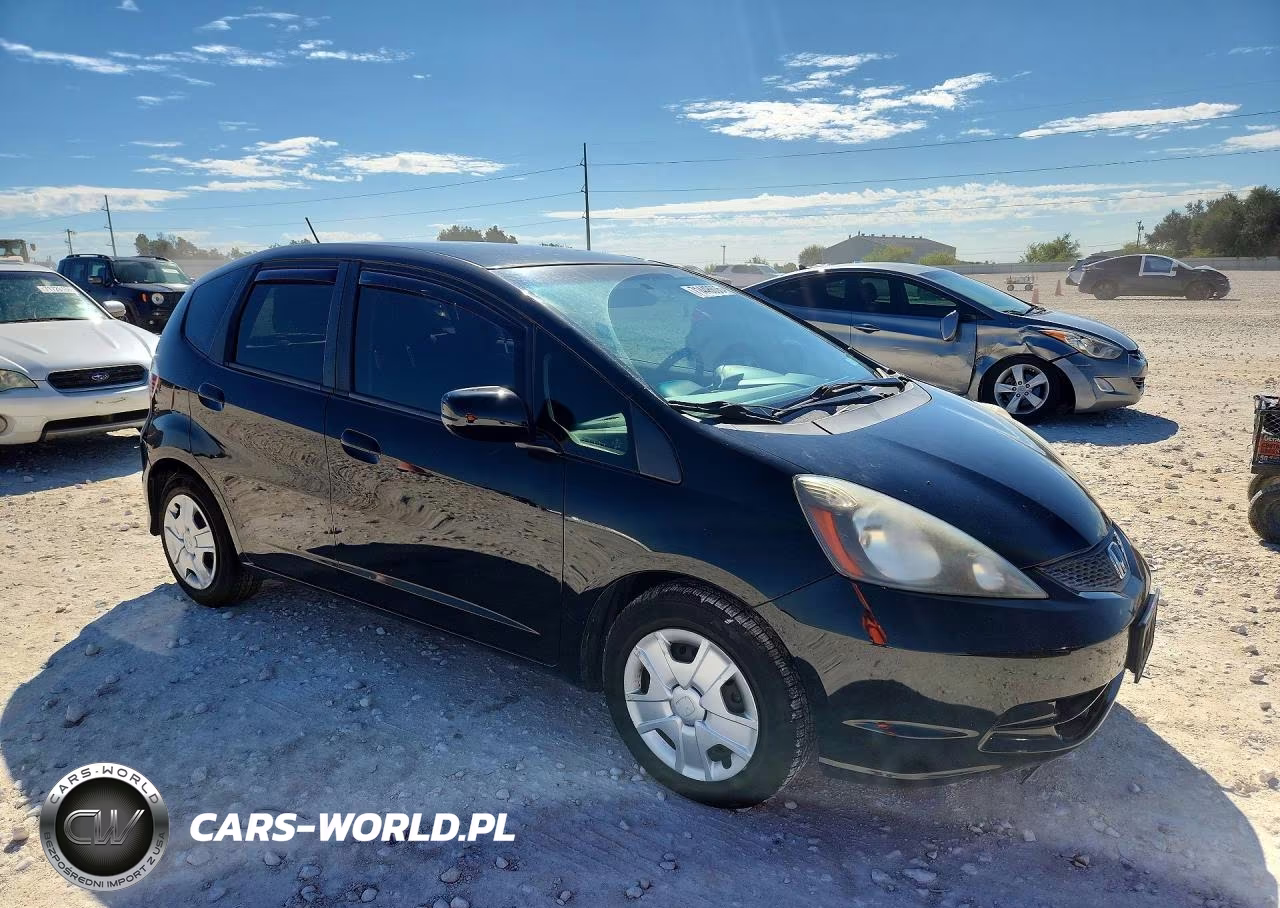 2012 Honda Fit VIN:JHMGE8H33CC002565 - 4