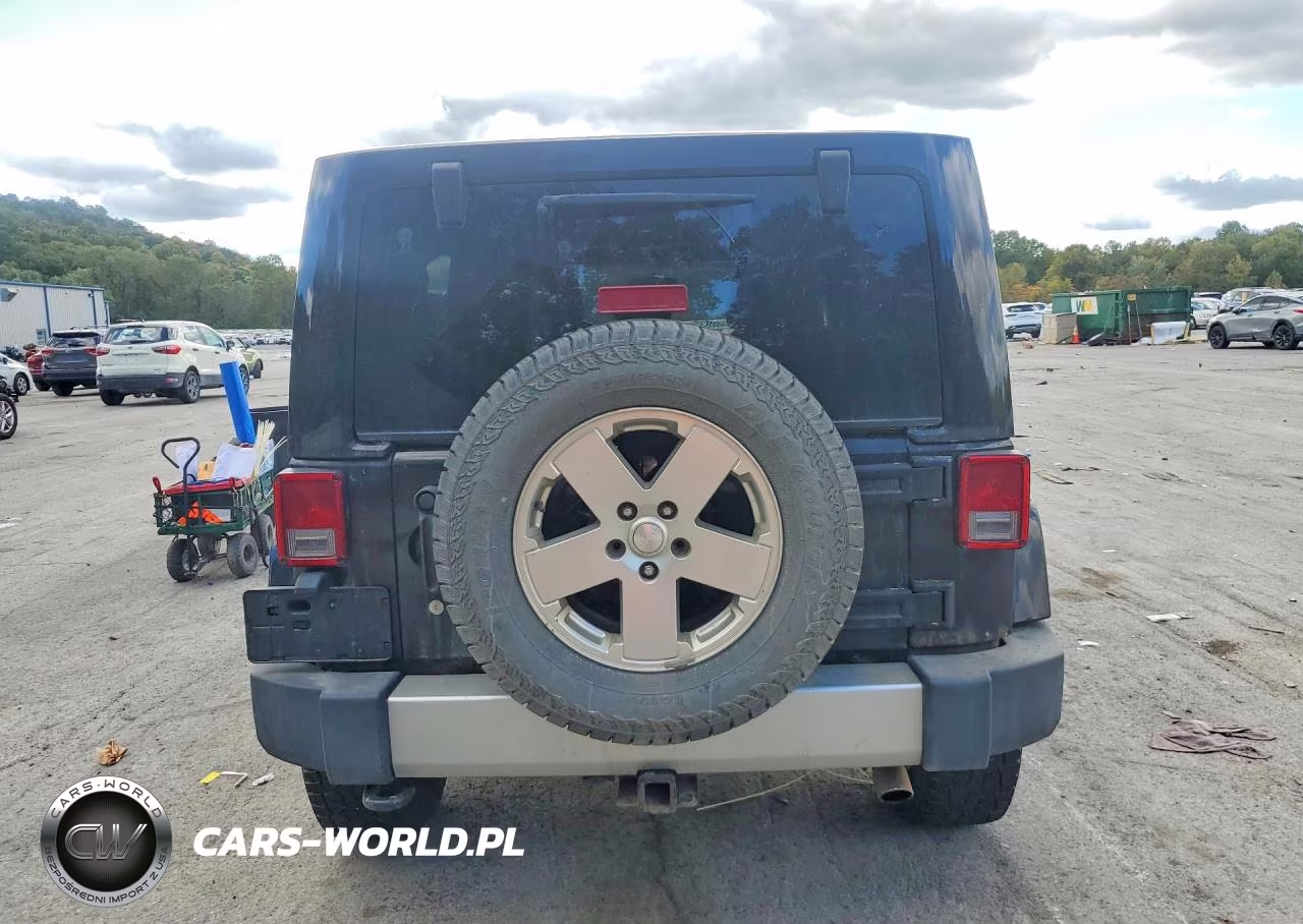 2011 Jeep Wrangler Unlimited Sahara VIN:1J4BA5H16BL526581 - 6