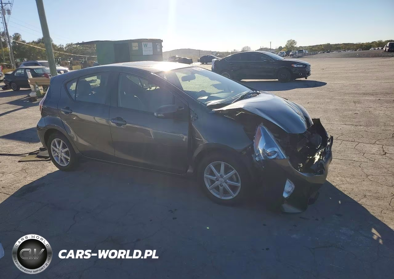 2015 Toyota Prius C Four VIN:JTDKDTB35F1100281 - 4