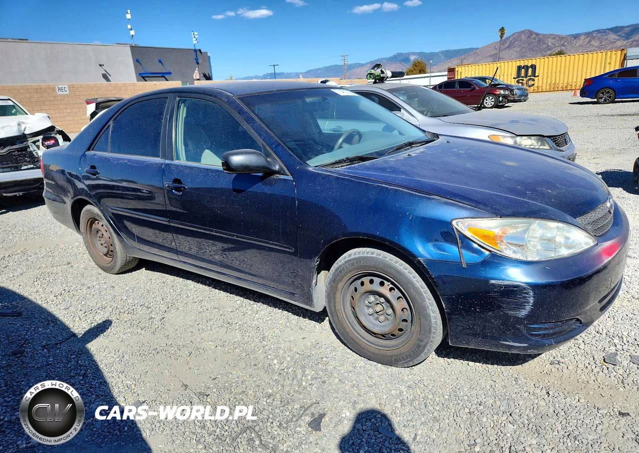 2004 Toyota Camry Le VIN:JTDBE32K340255273 - 4
