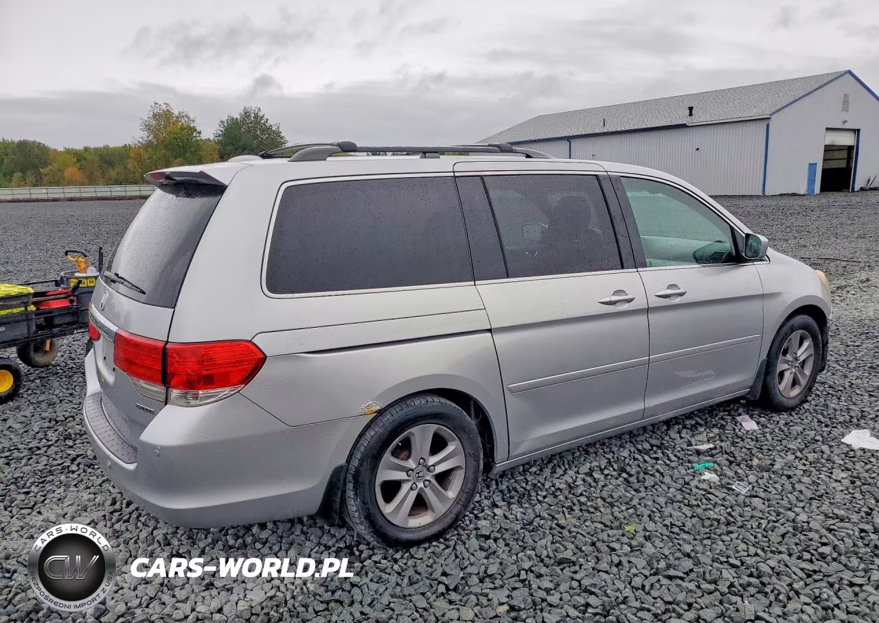 2010 Honda Odyssey Touring VIN:5FNRL3H93AB108800 - 3