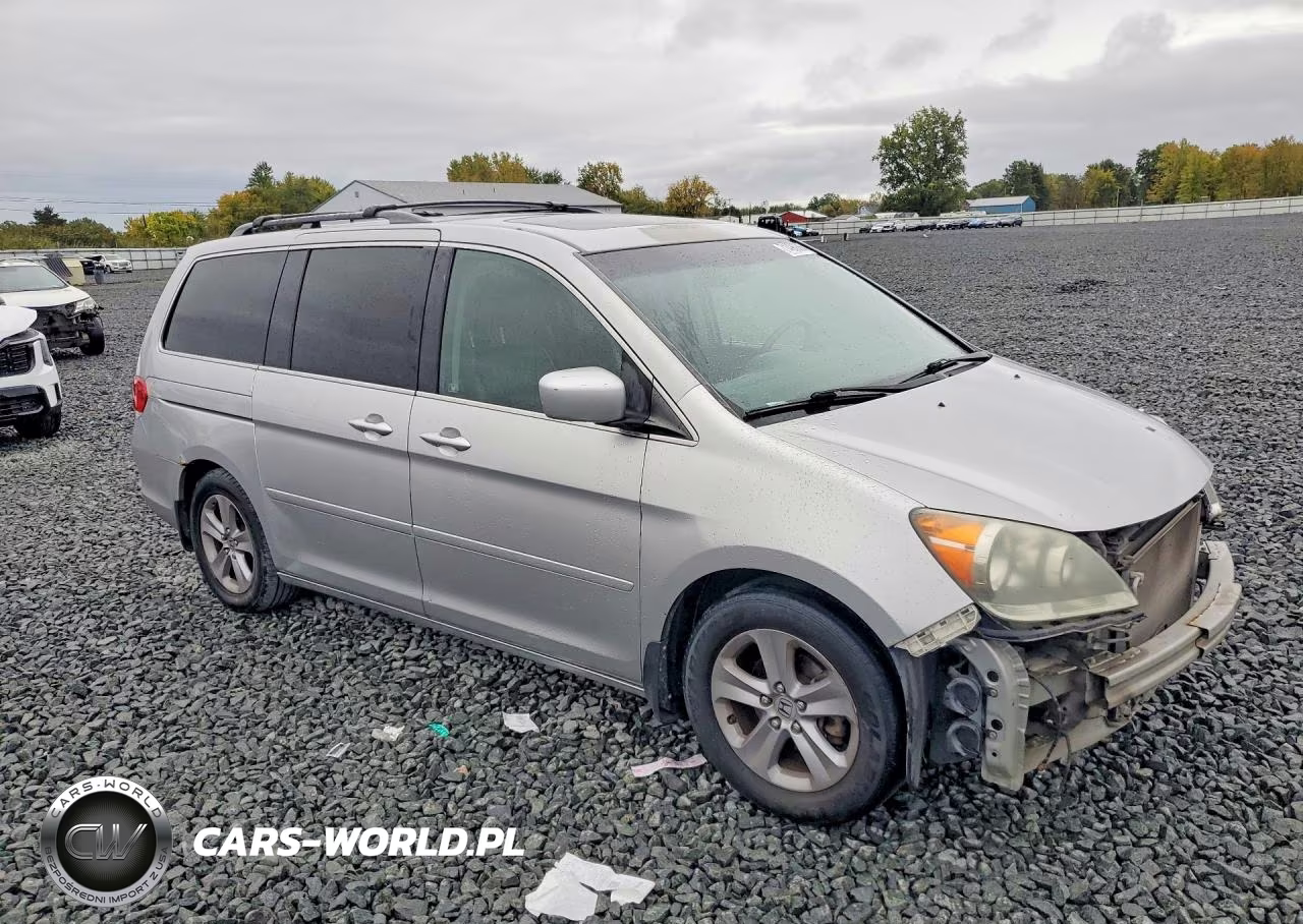 2010 Honda Odyssey Touring VIN:5FNRL3H93AB108800 - 4