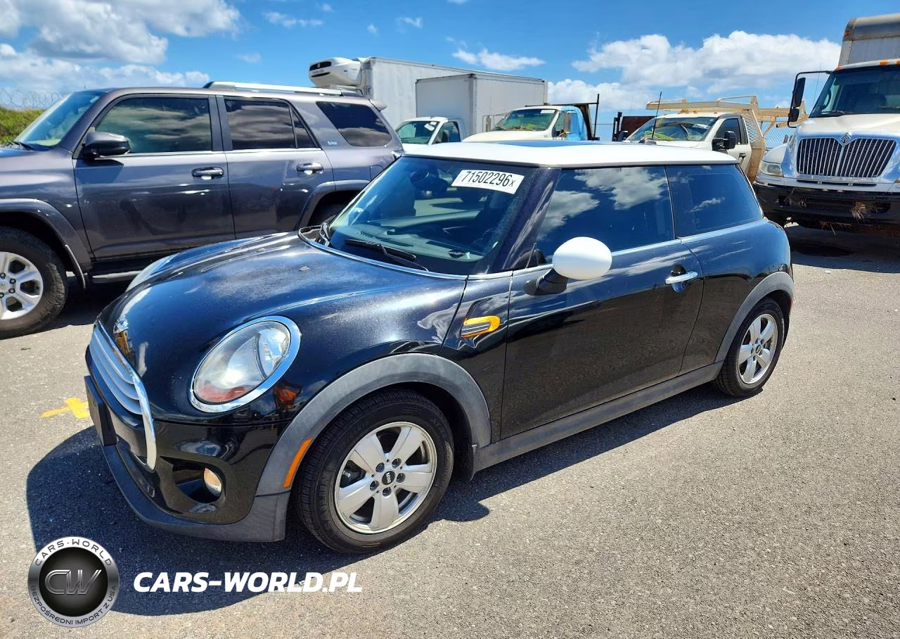 2015 Mini Cooper VIN:WMWXM5C51F3A58875 - 1