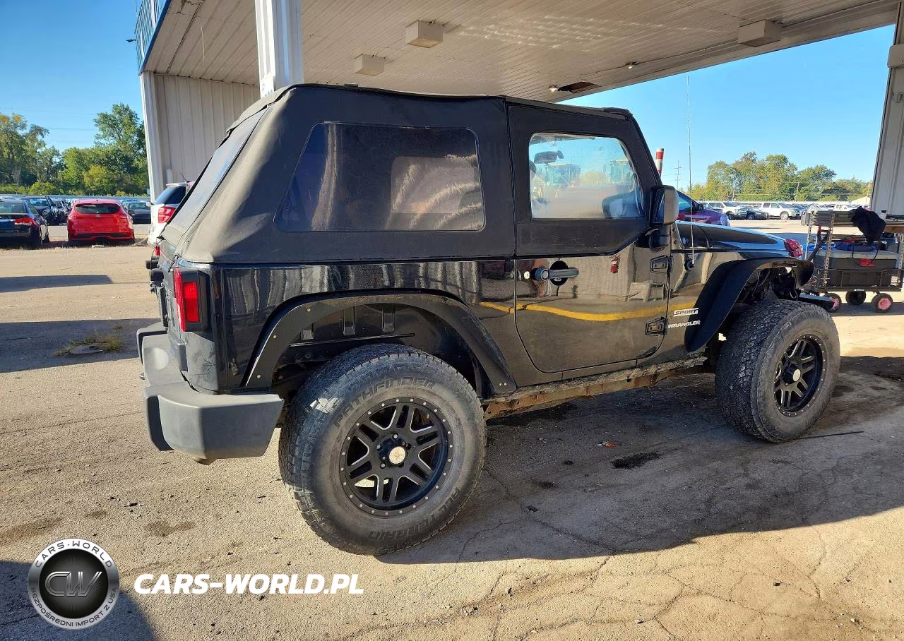 2011 Jeep Wrangler Sport VIN:1J4AA2D11BL630217 - 3