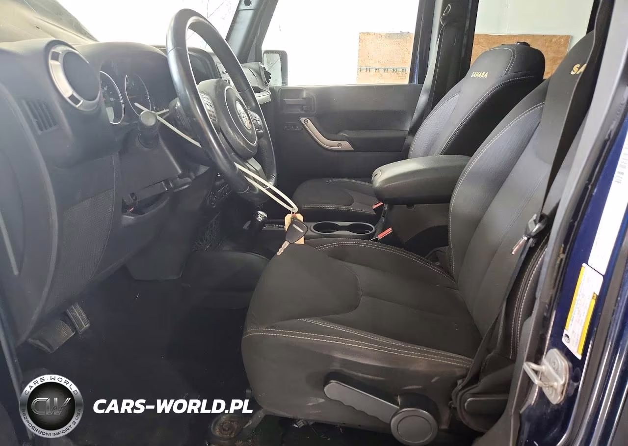 2013 Jeep Wrangler Unlimited Sahara VIN:1C4BJWEG9DL619702 - 7