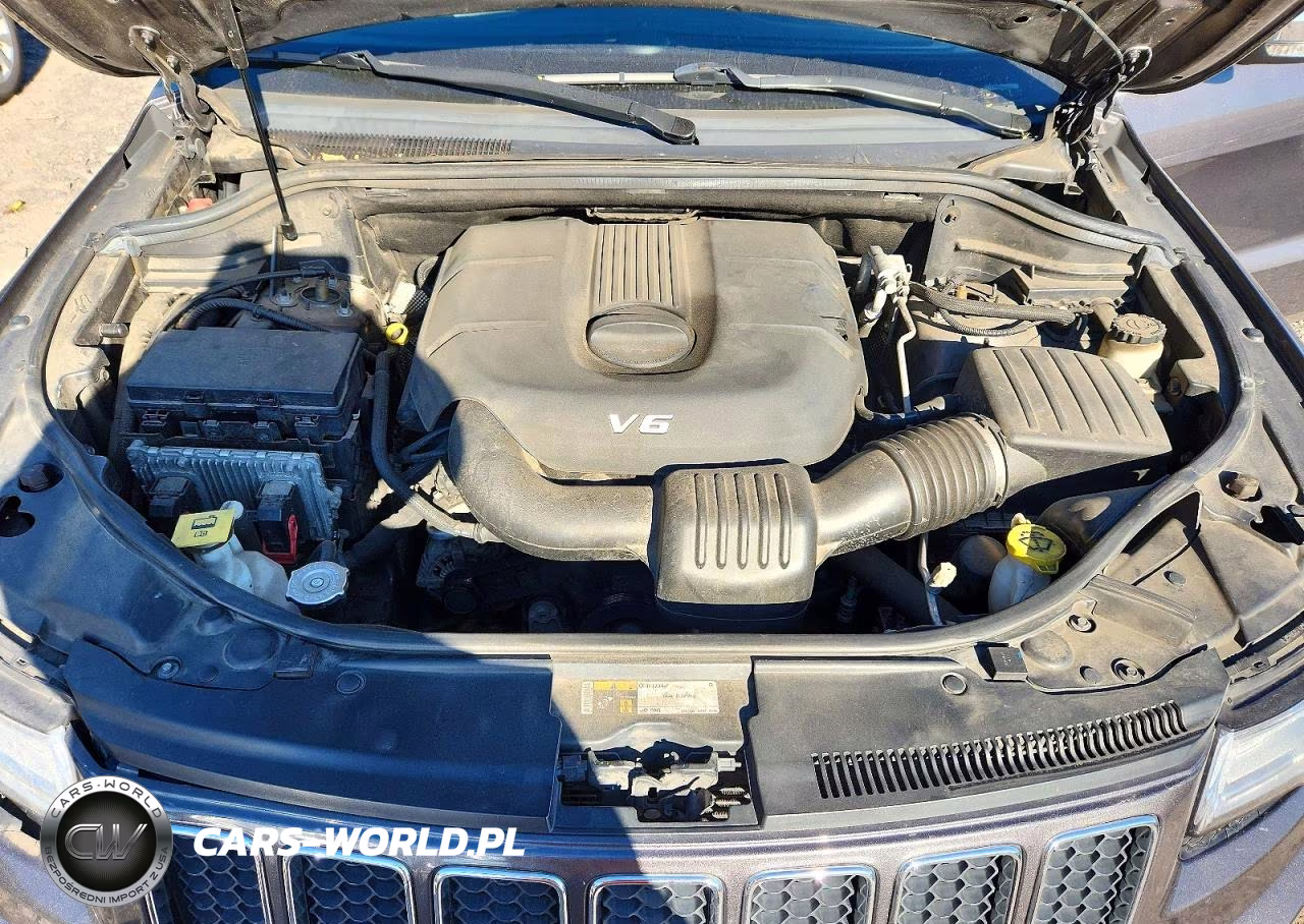 2015 Jeep Grand Cherokee Overland VIN:1C4RJFCG0FC887526 - 12