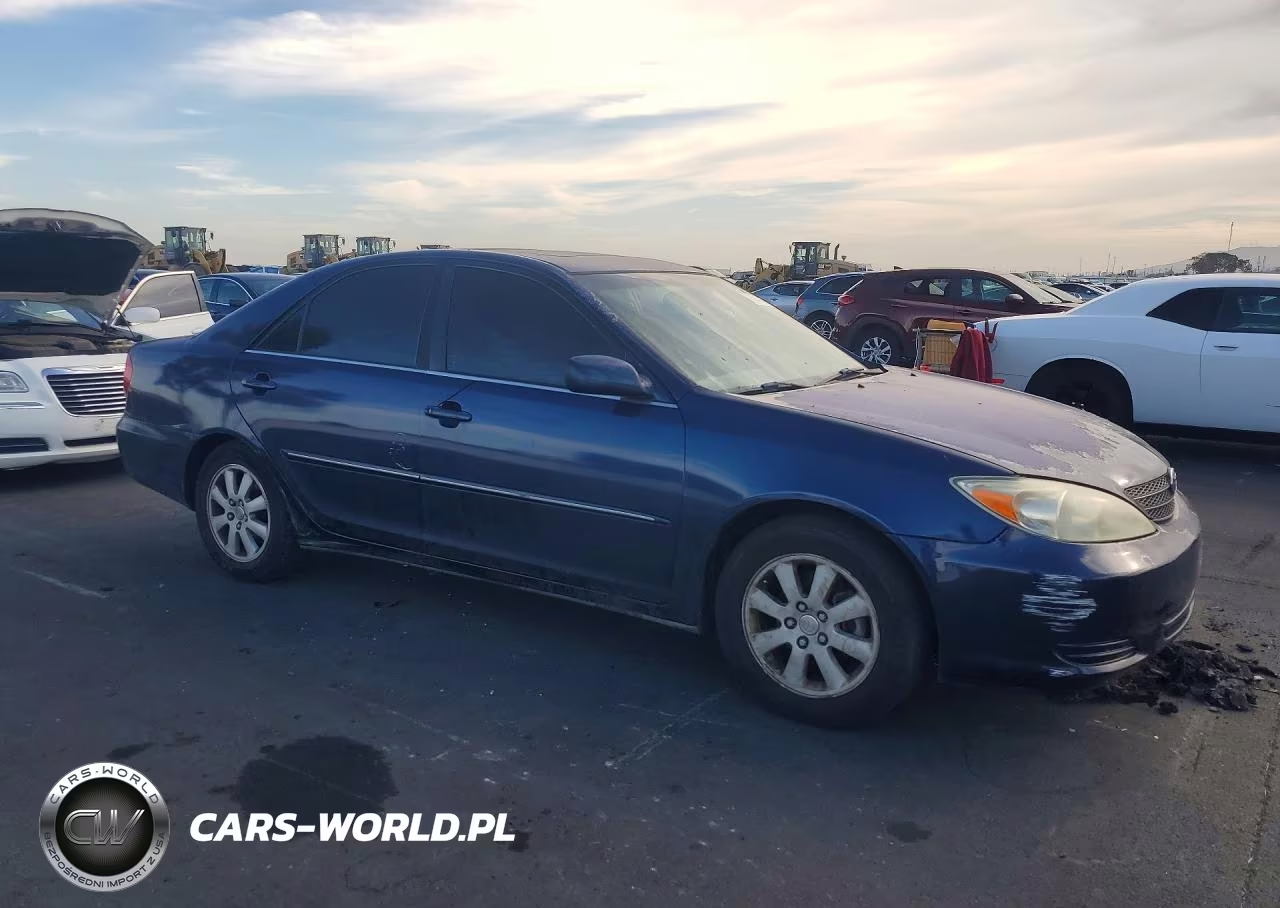 2002 Toyota Camry VIN:4T1BE30KX2U625722 - 4