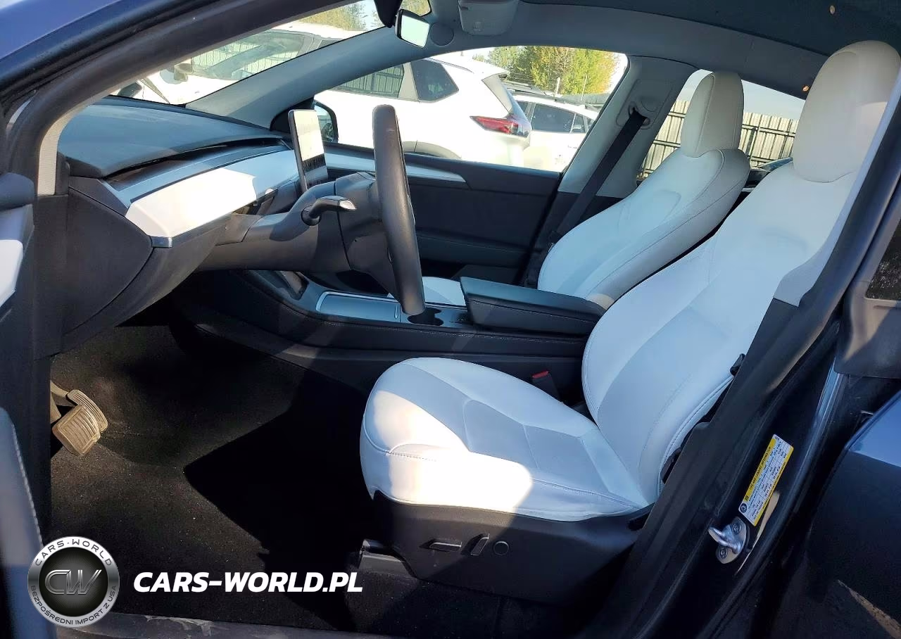 2023 Tesla Model Y VIN:7SAYGDEE6PF873745 - 7