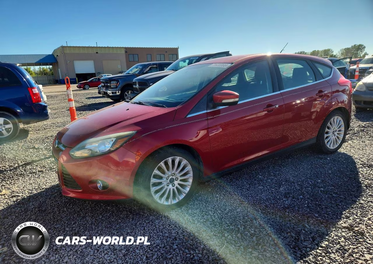2012 Ford Focus Titanium VIN:1FAHP3N29CL477075 - 1