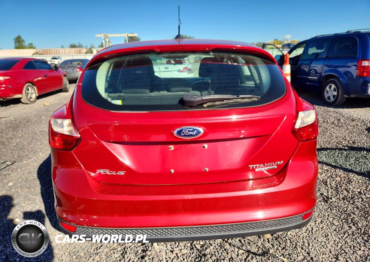2012 Ford Focus Titanium VIN:1FAHP3N29CL477075 - 6