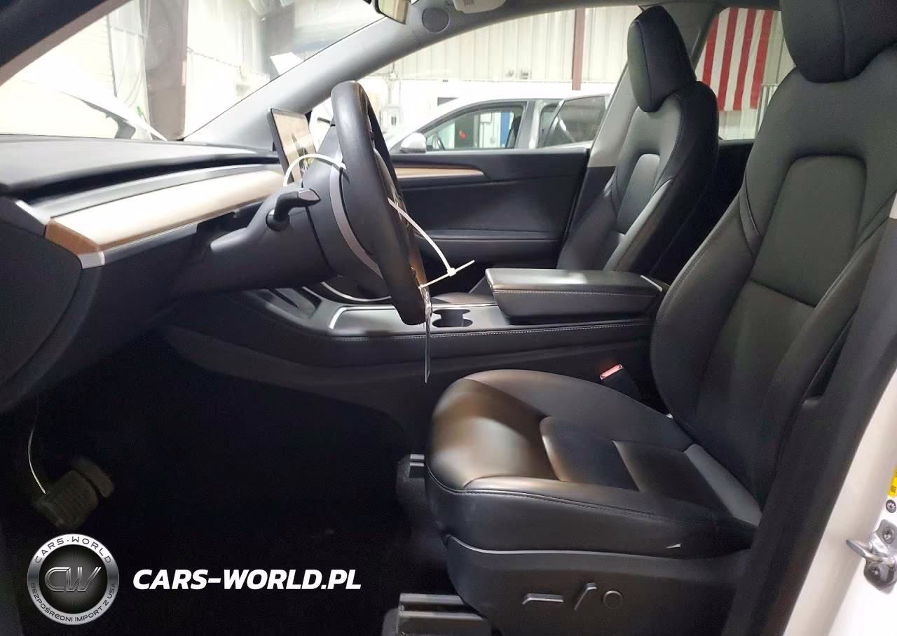 2023 Tesla Model Y VIN:7SAYGDEE3PA100776 - 7
