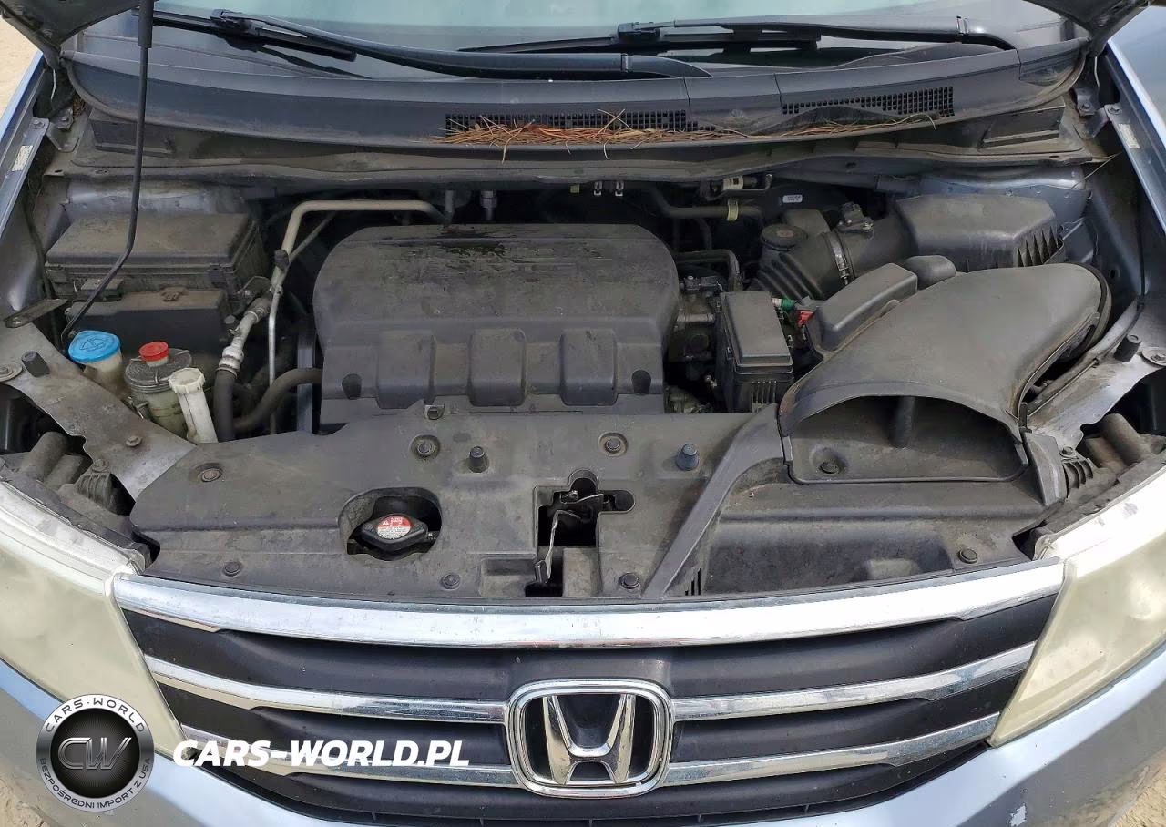 2012 Honda Odyssey Touring VIN:5FNRL5H98CB130628 - 12