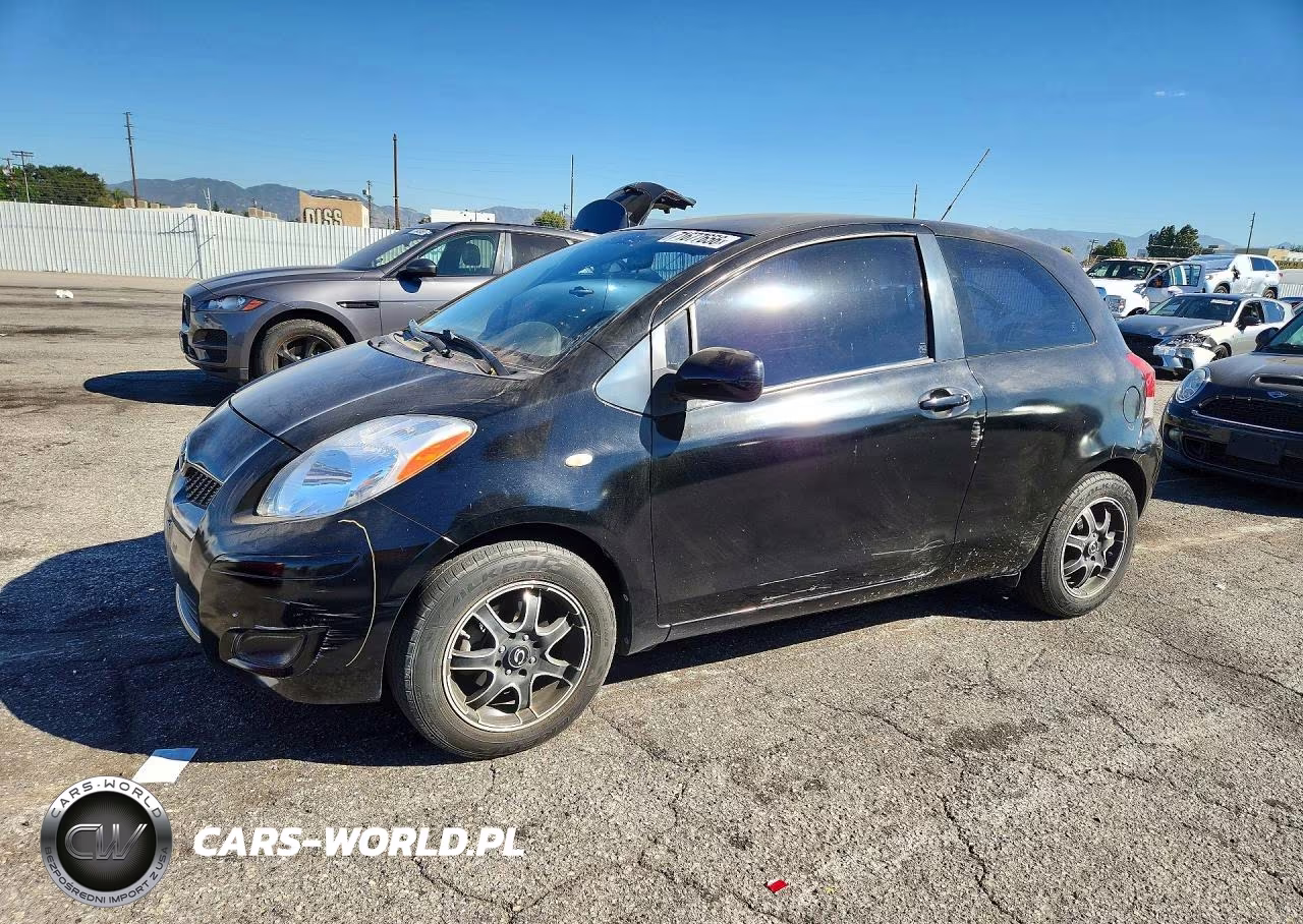 2009 Toyota Yaris Base VIN:JTDJT903695276113 - 1