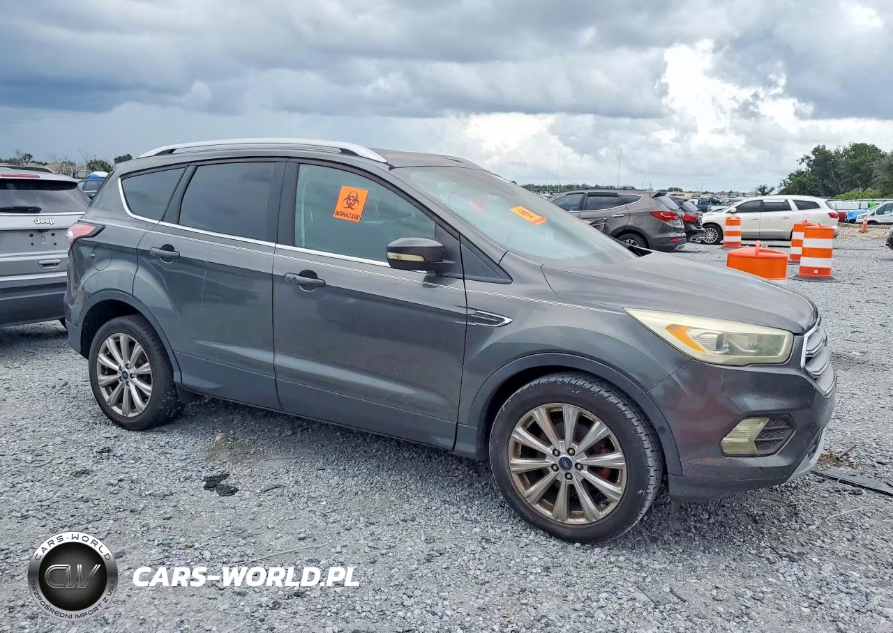2017 Ford Escape Titanium VIN:1FMCU0JDXHUA88980 - 4