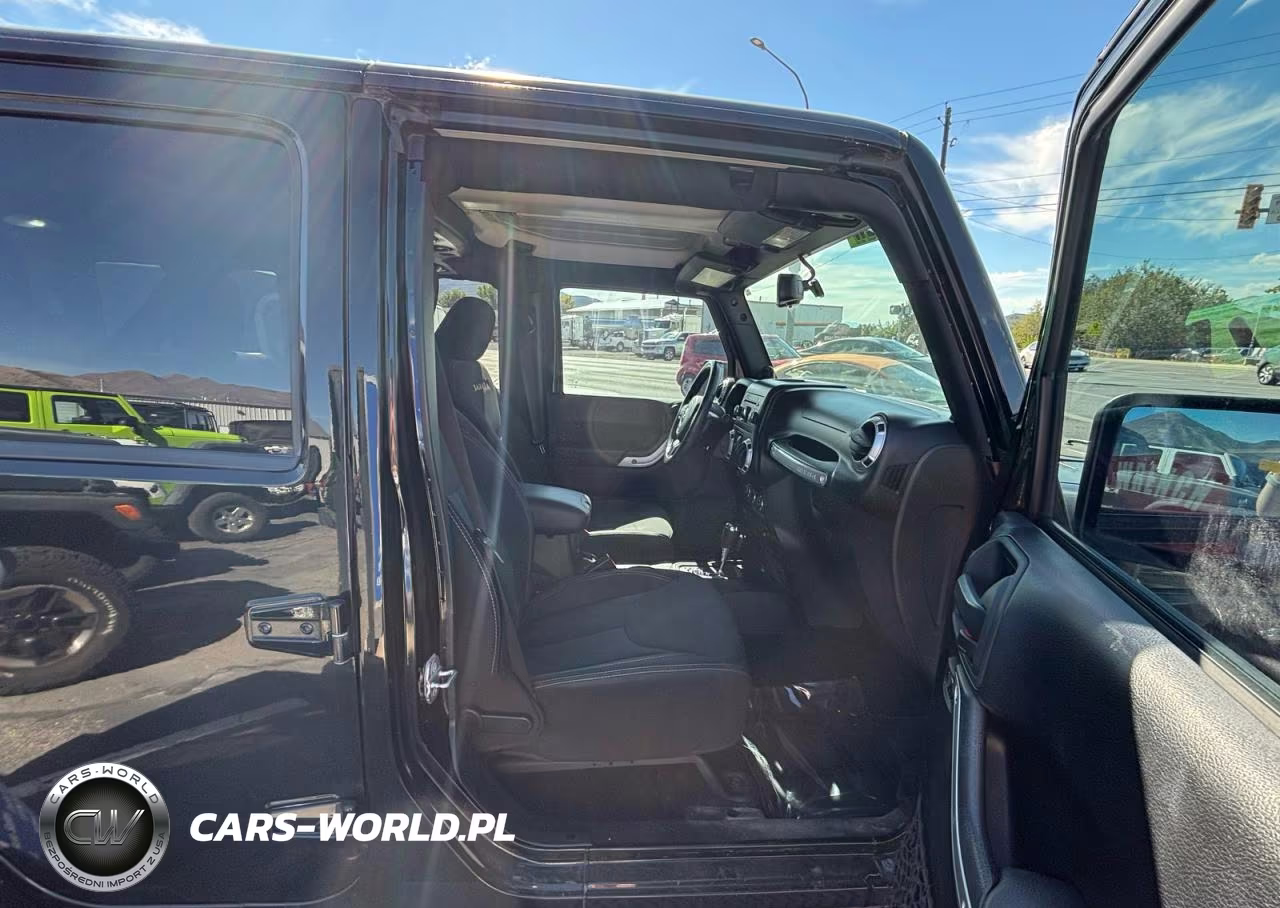 2014 Jeep Wrangler Unlimited Sahara VIN:1C4BJWEG2EL178982 - 5