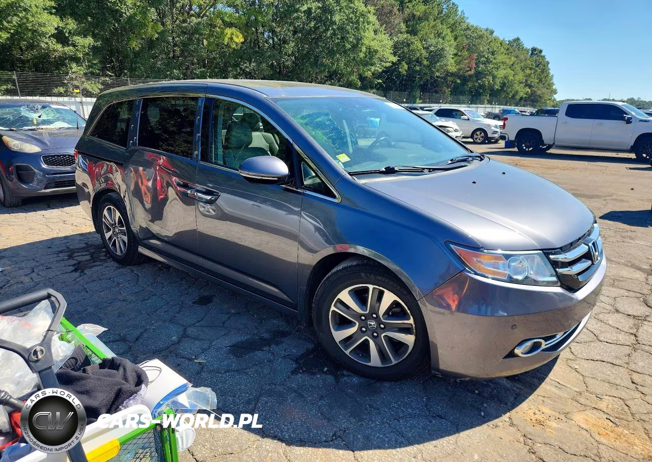 2014 Honda Odyssey Touring VIN:5FNRL5H93EB064069 - 4