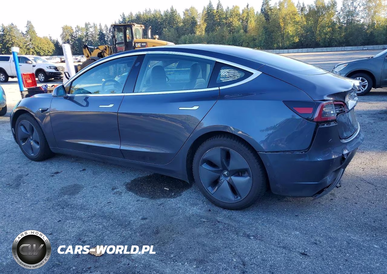 2018 Tesla Model 3 VIN:5YJ3E1EB0JF129180 - 2