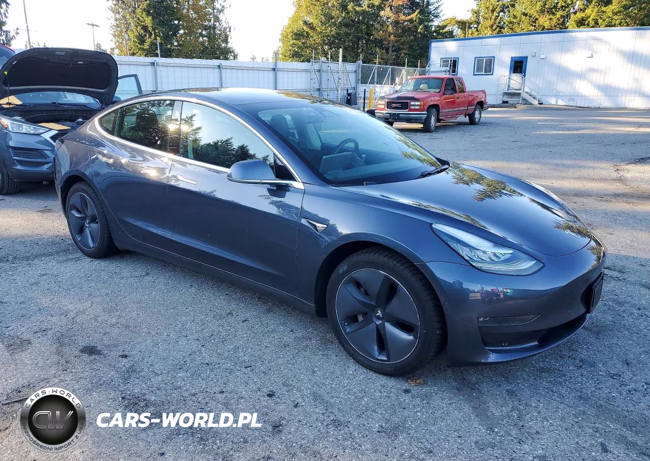 2018 Tesla Model 3 VIN:5YJ3E1EB0JF129180 - 4