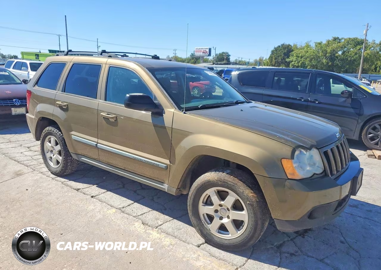 2009 Jeep Grand Cherokee Laredo VIN:1J8GR48K39C541064 - 4