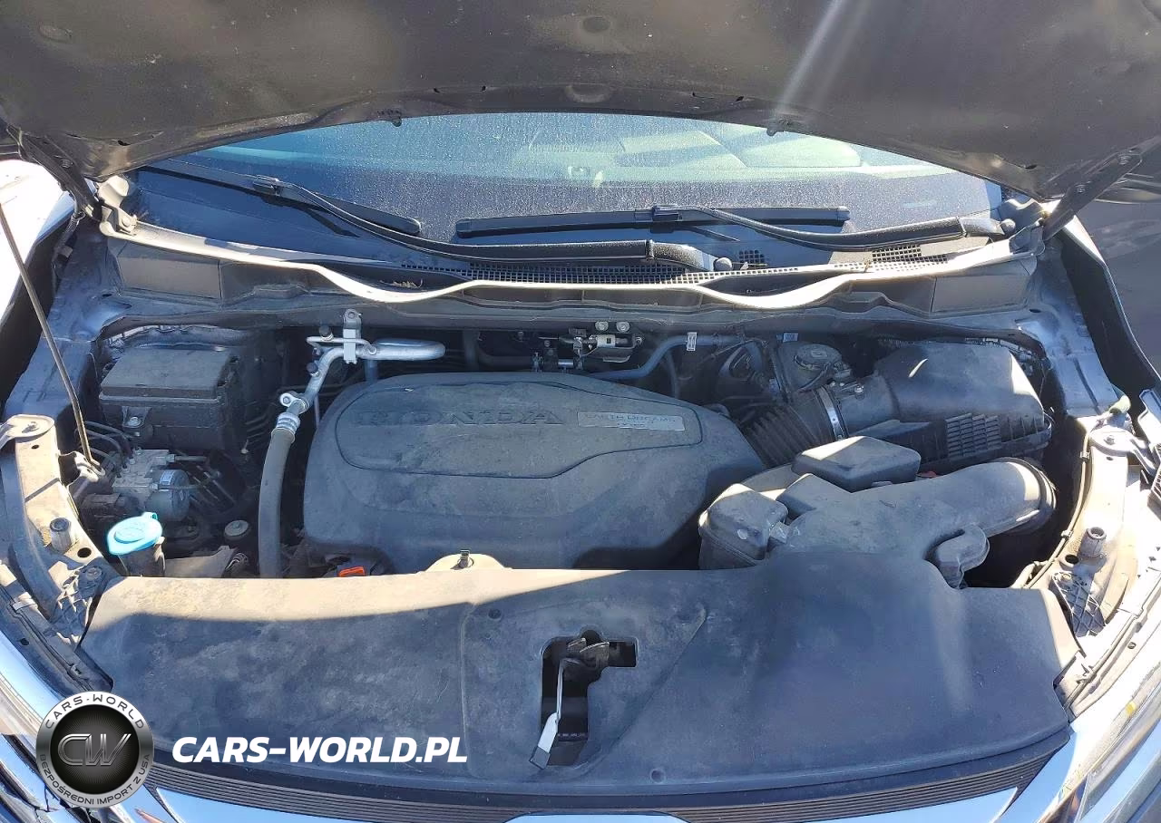 2018 Honda Odyssey Touring VIN:5FNRL6H89JB060146 - 12