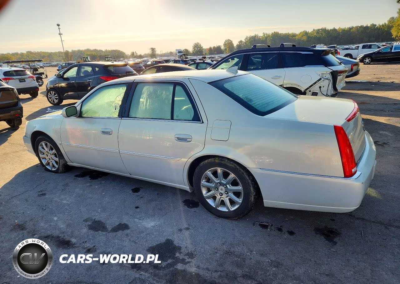 2009 Cadillac Dts VIN:1G6KD57Y19U144476 - 2