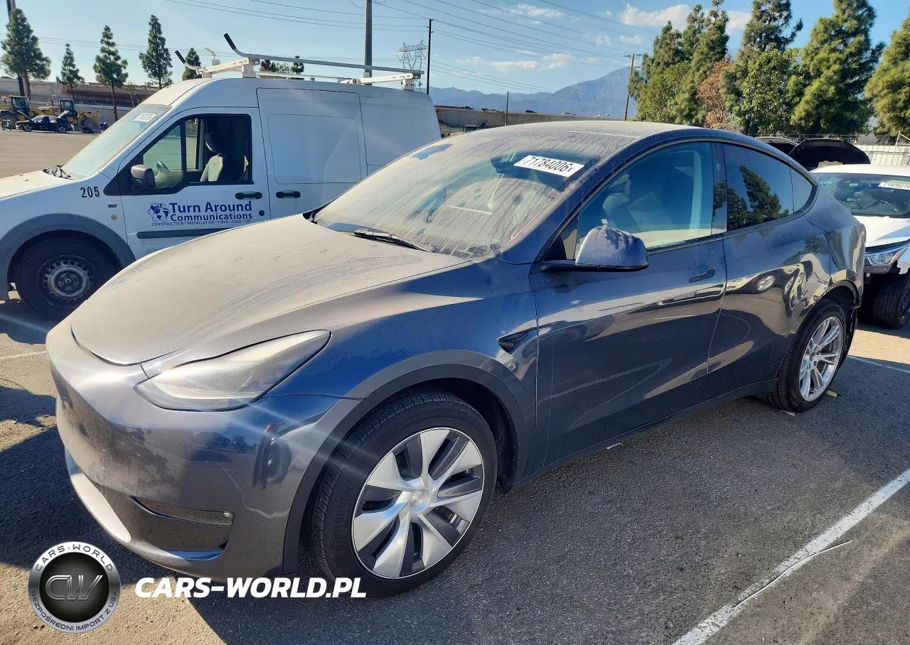 2023 Tesla Model Y VIN:7SAYGDEE1PF907705 - 1