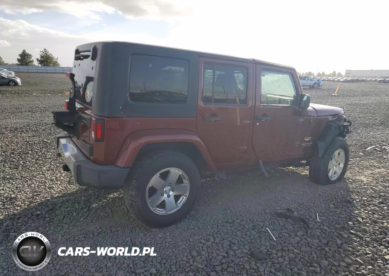 2009 Jeep Wrangler Unlimited Sahara VIN:1J4GA59169L767054 - 3