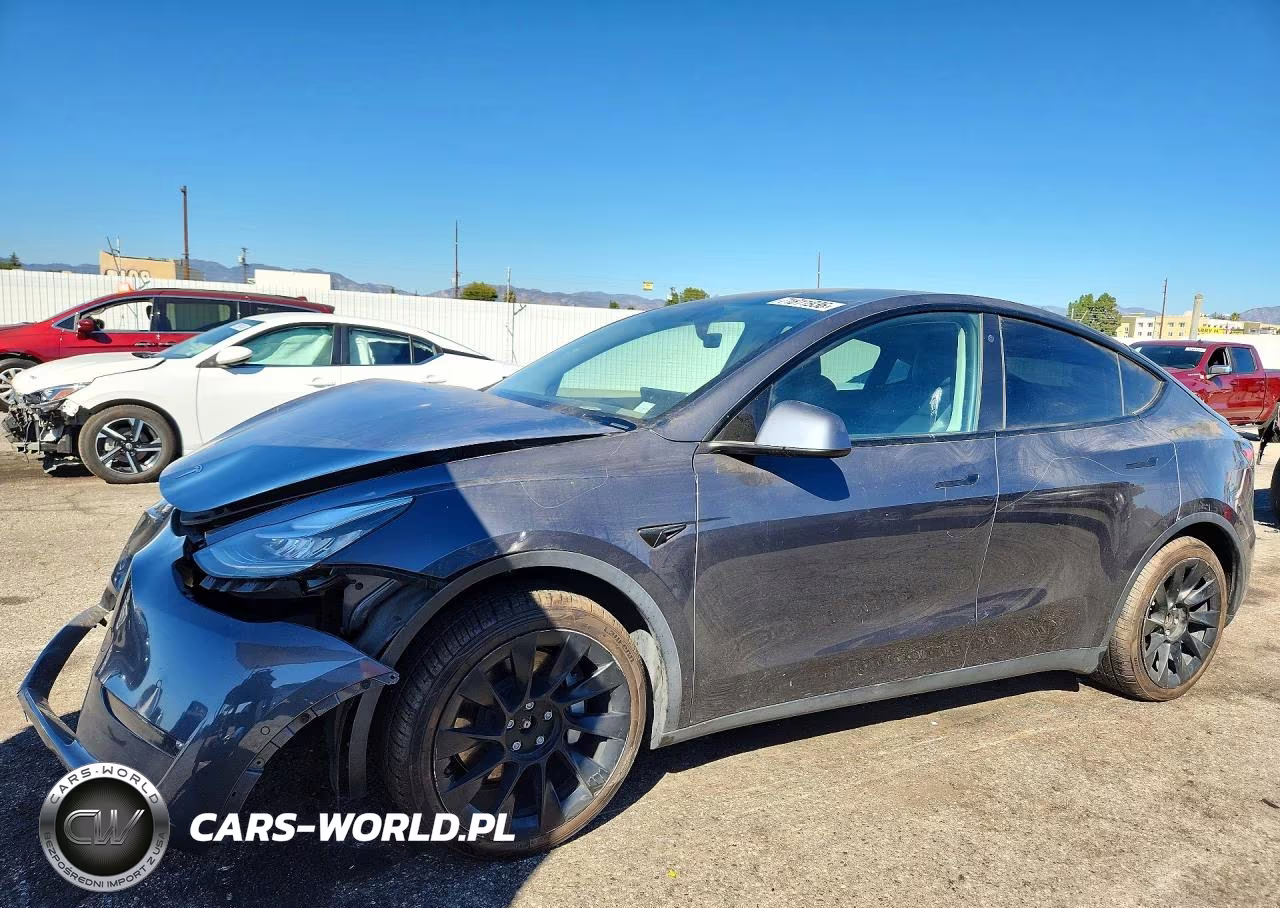 2022 Tesla Model Y VIN:7SAYGDEE9NF355870 - 1