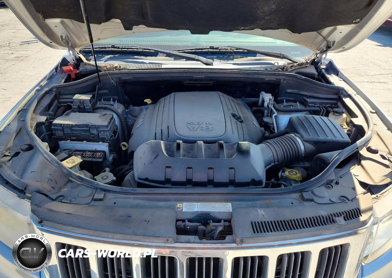 2012 Jeep Grand Cherokee Laredo VIN:1C4RJEATXCC361605 - 12