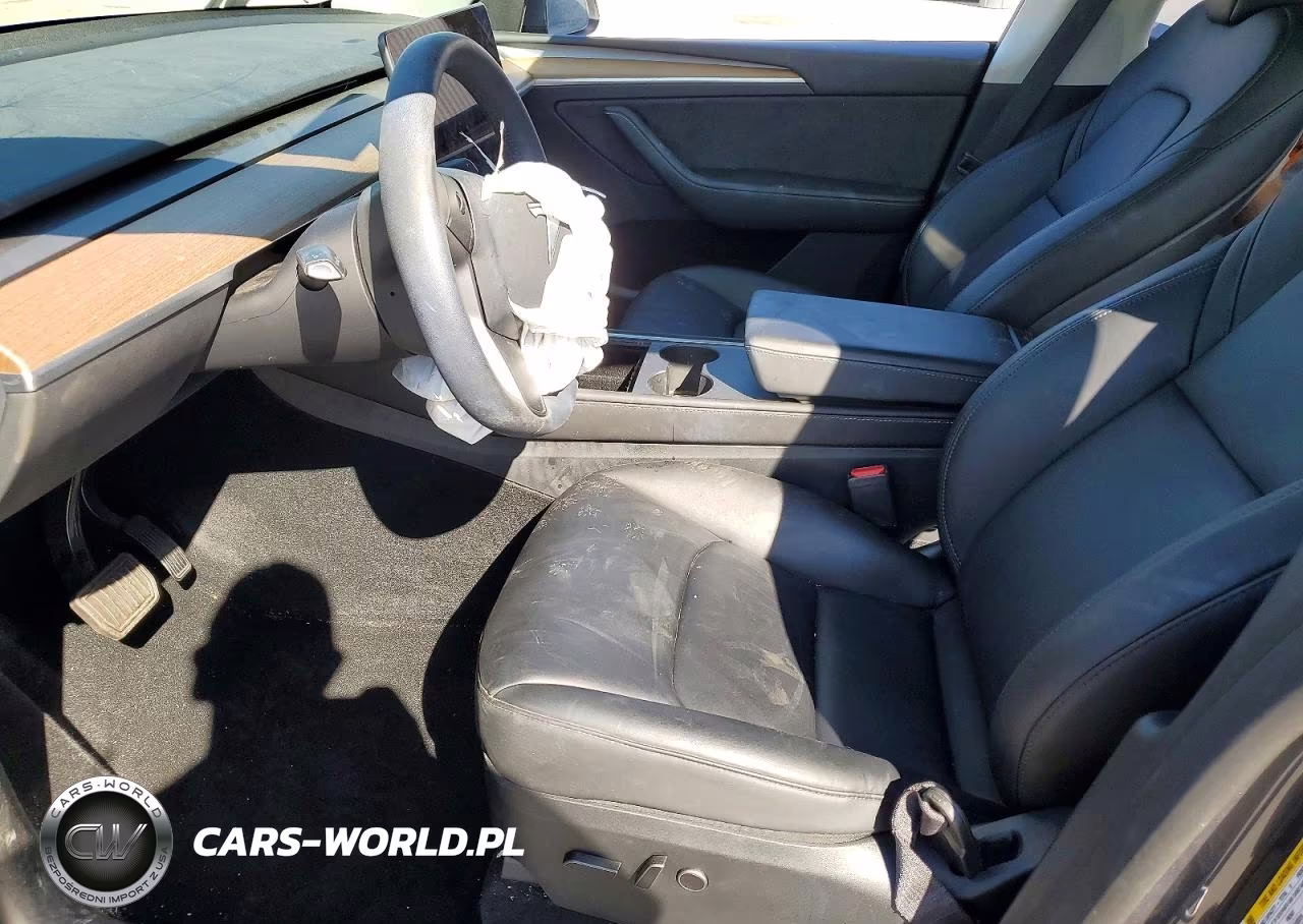 2023 Tesla Model Y VIN:7SAYGDEE8PF869700 - 7