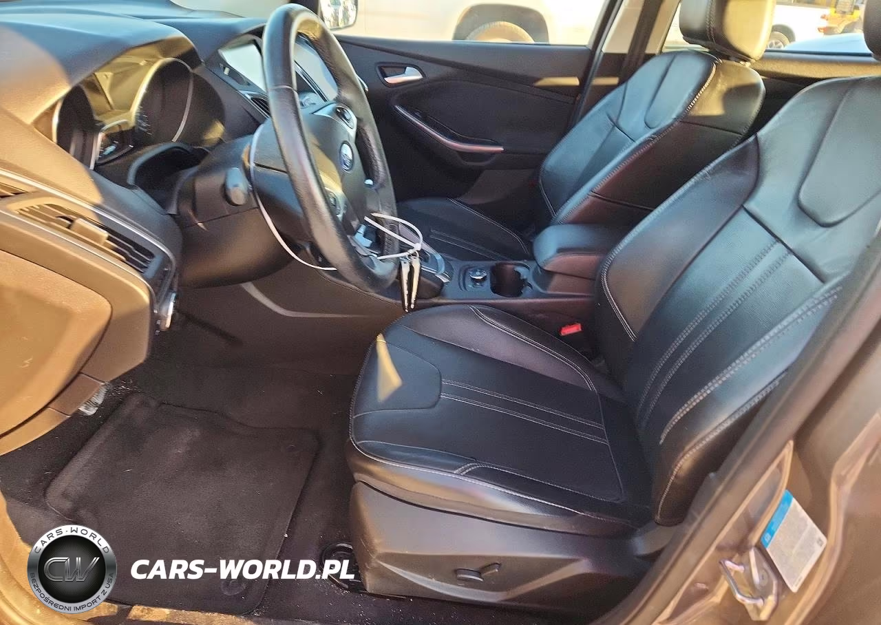 2014 Ford Focus Titanium VIN:1FADP3N22EL381001 - 7