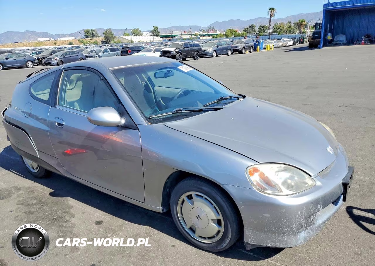 2005 Honda Insight VIN:JHMZE13785S000507 - 4