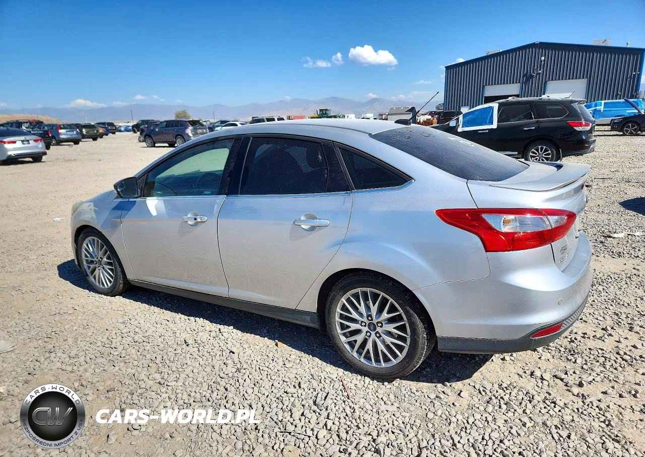 2014 Ford Focus Titanium VIN:1FADP3J27EL463277 - 2