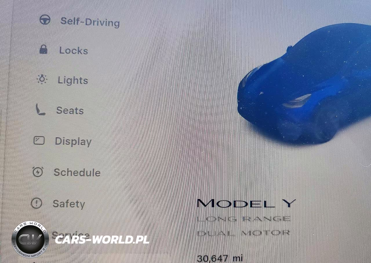 2023 Tesla Model Y VIN:7SAYGDEE8PF594586 - 9