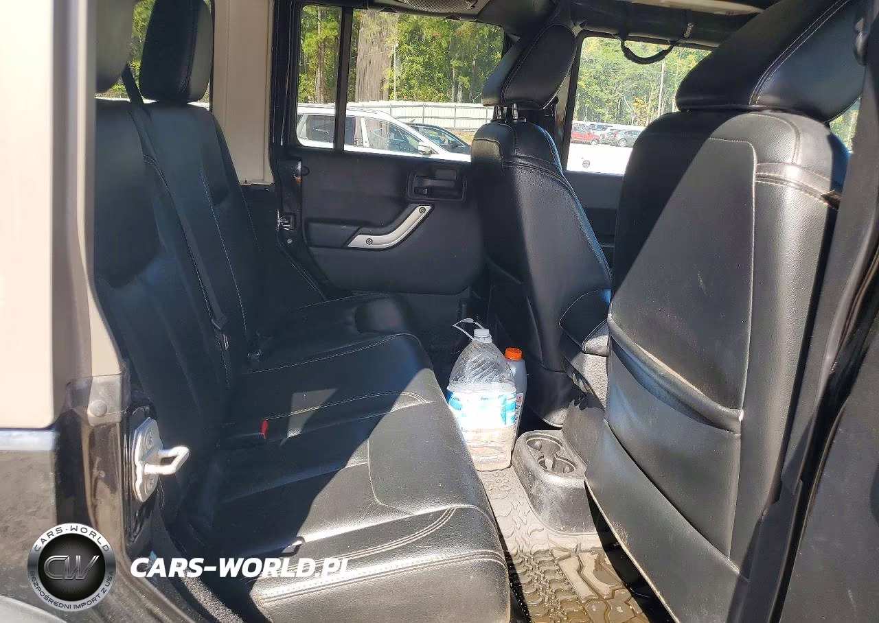 2014 Jeep Wrangler Unlimited Rubicon VIN:1C4HJWFG1EL220681 - 11