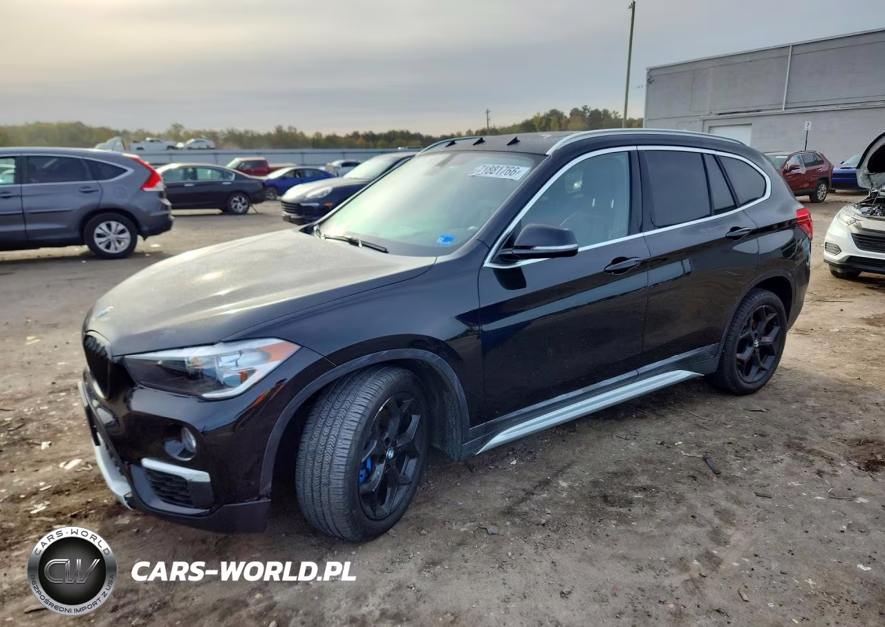 2018 BMW X1 xDrive28I VIN:WBXHT3C31J3H33004 - 1