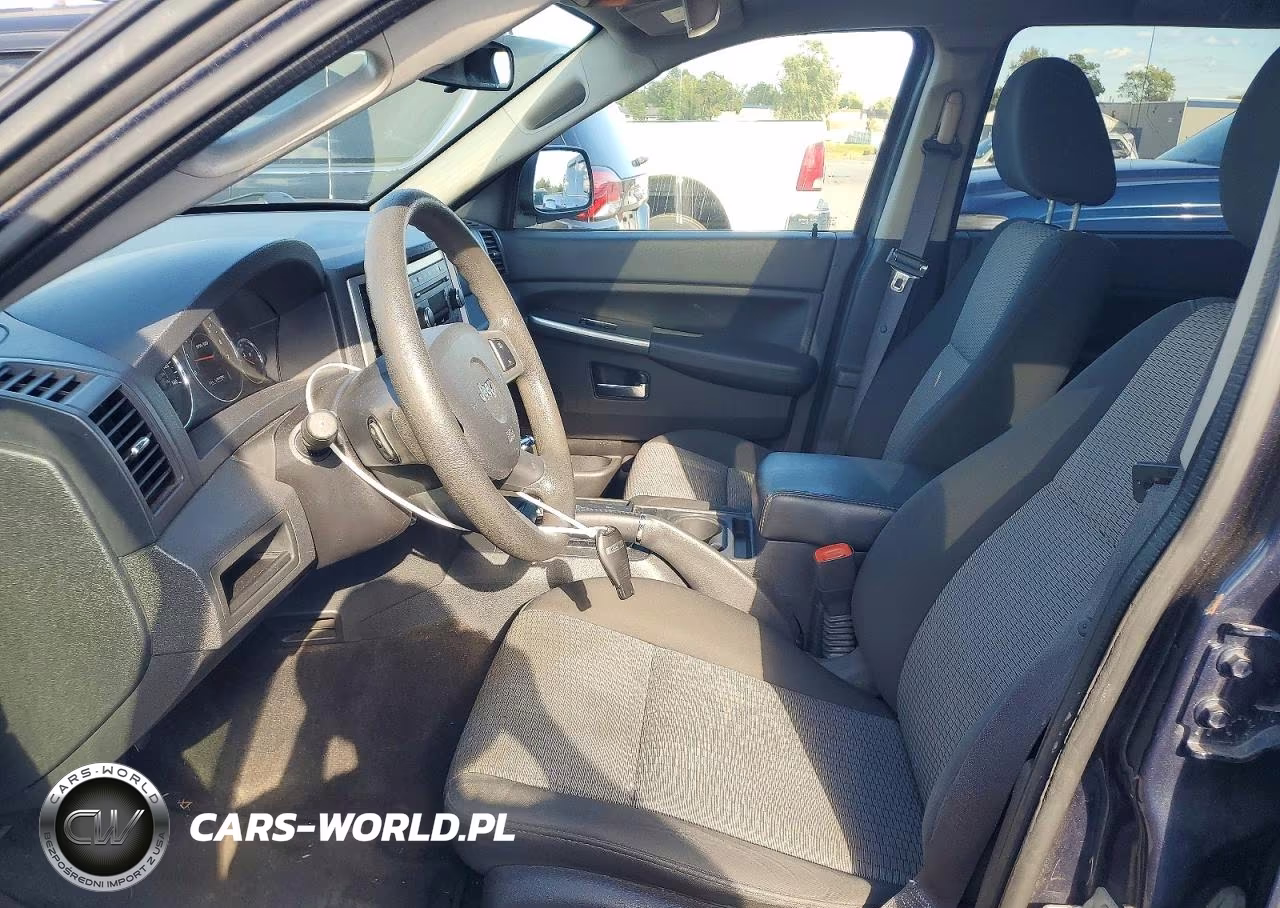 2009 Jeep Grand Cherokee Laredo VIN:1J8GR48K69C528079 - 7