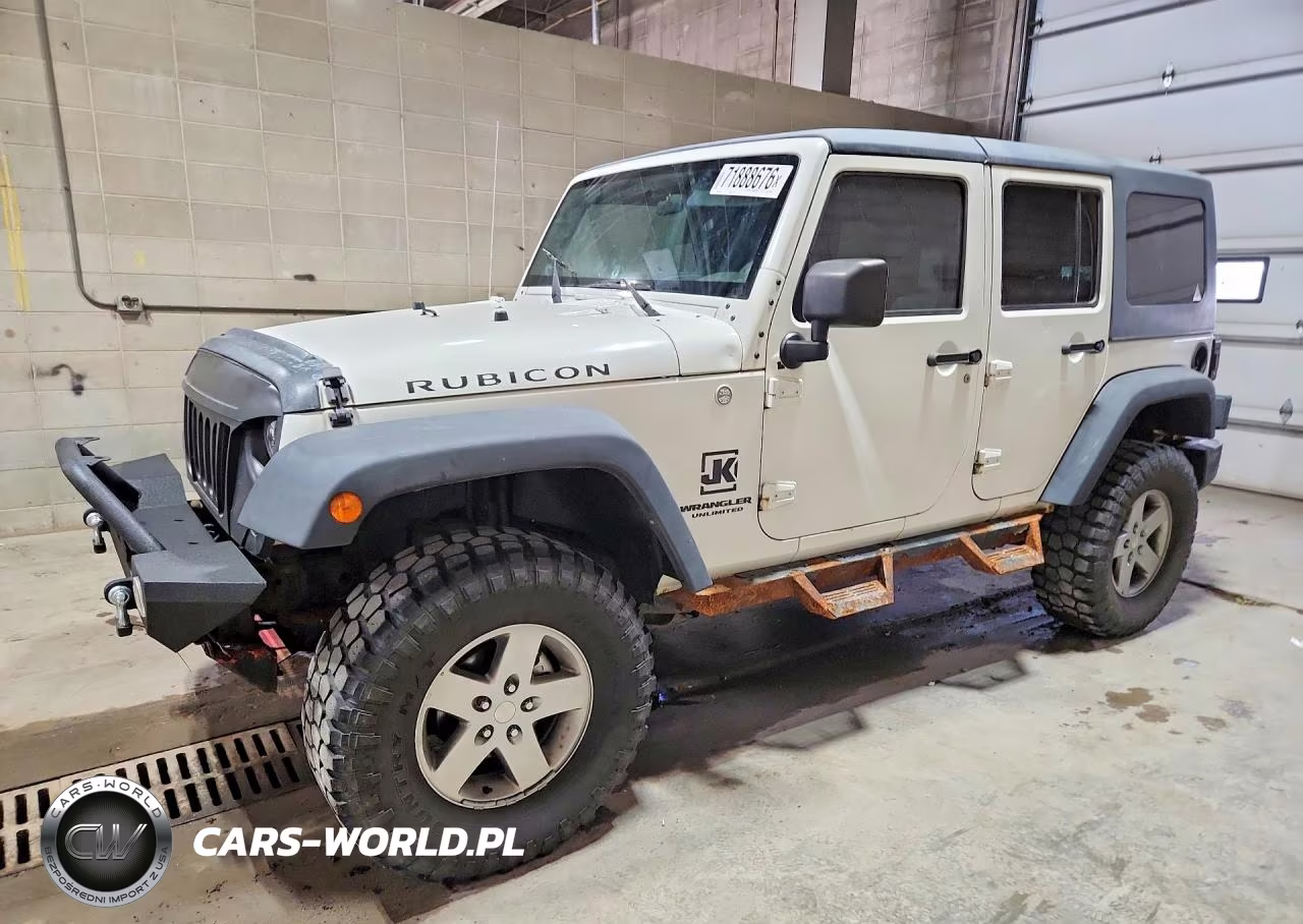 2010 Jeep Wrangler Unlimited Rubicon VIN:1J4BA6H13AL111450 - 1