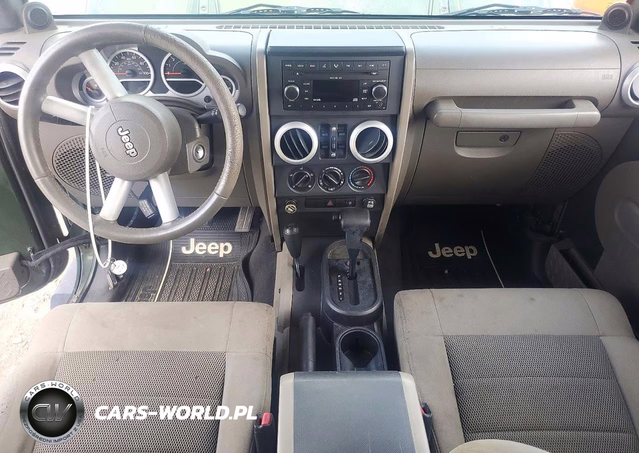 2008 Jeep Wrangler Unlimited Sahara VIN:1J4GA59138L537650 - 8