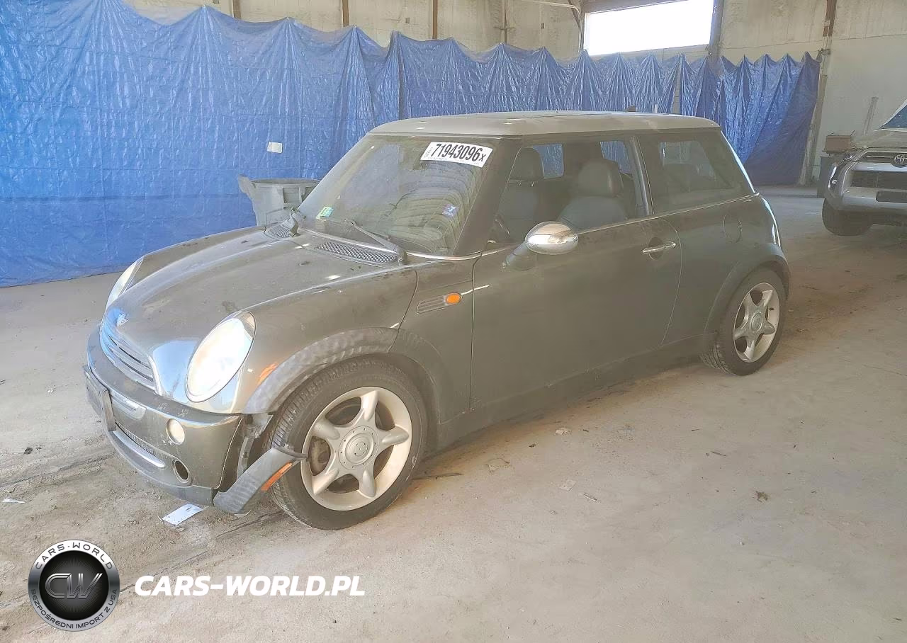 2006 Mini Cooper VIN:WMWRC33596TK63874 - 1