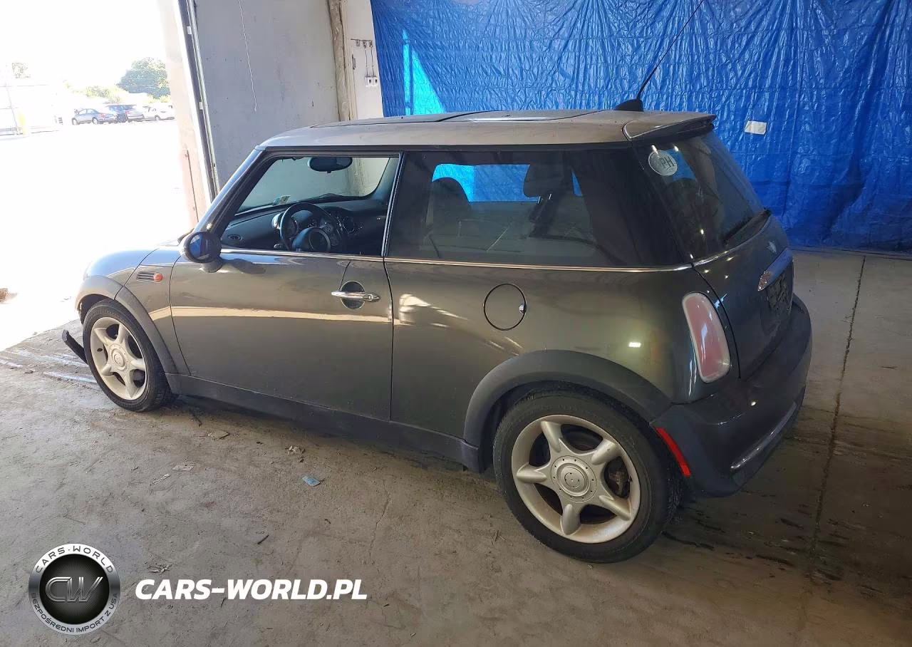 2006 Mini Cooper VIN:WMWRC33596TK63874 - 2